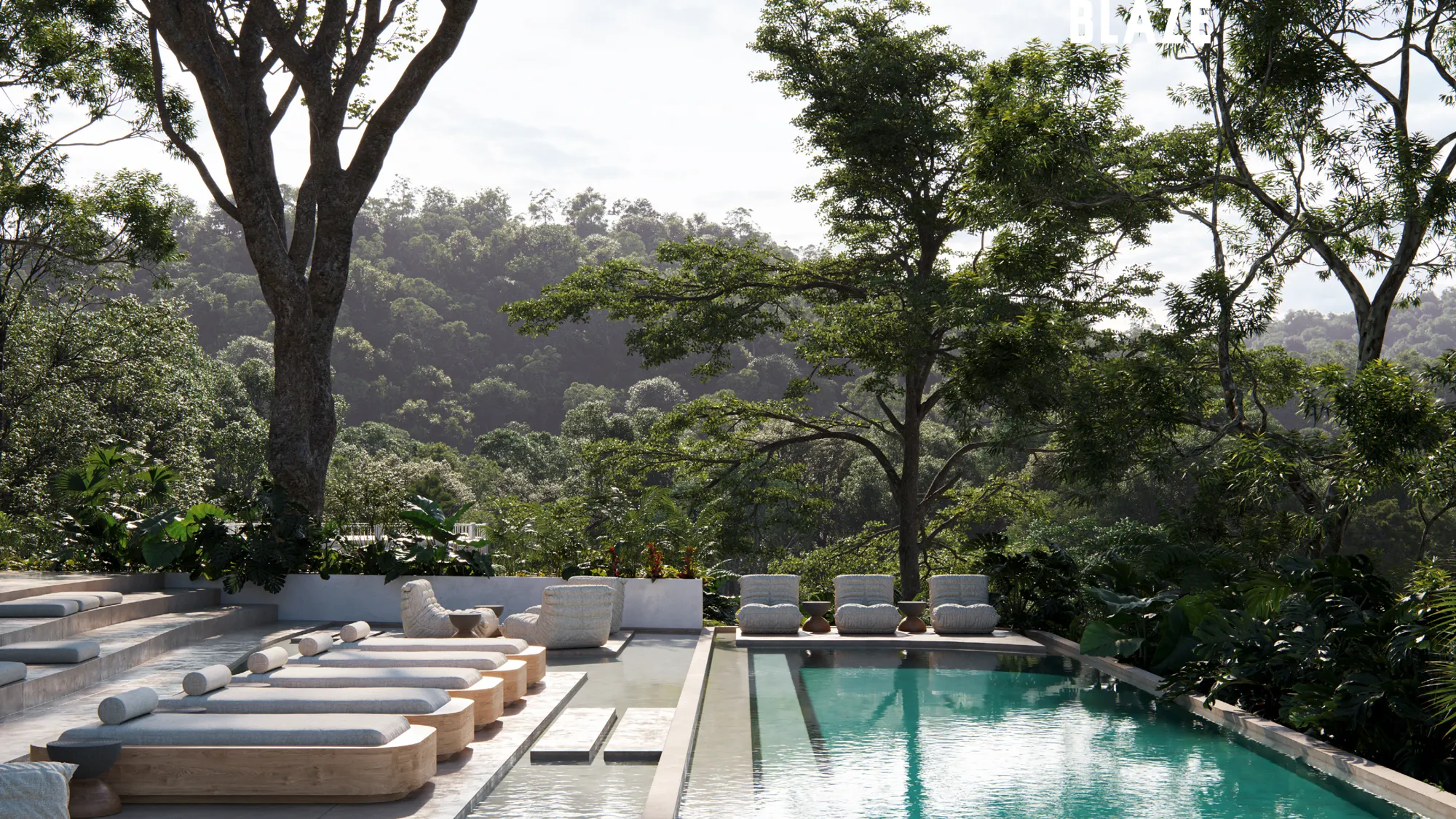 Outdoor pool at Blaze Guatapé surrounded by forest with lake views